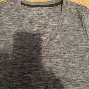 Woman’s extra small Under Armour shirt sleeved top